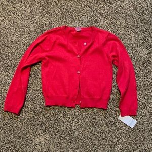 Carter’s red cardigan with jewel buttons.